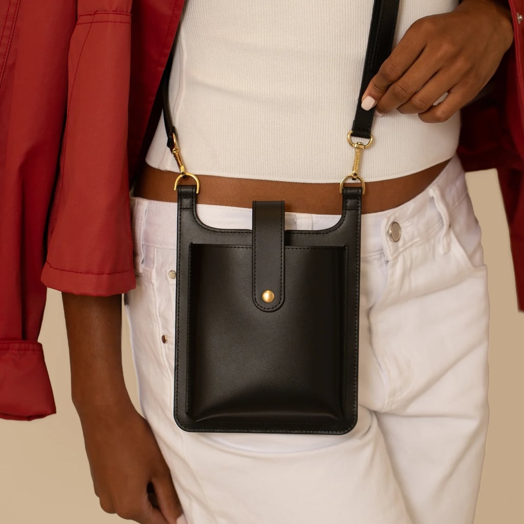 Bandolier Parker Phone Bag ($84, originally $168)
Everyone's favorite phone accessory brand has products up to 50 percent off for the holiday — and this is one such item. If you don't love crossbody phone straps that attach directly to the back of your phone, but you're also somewhat of a minimalist, this small, chic pouch is for you. The gold hardware elevates the look, and there's even a back zipper pocket for cards, cash, a pack of gum, or a key fob.