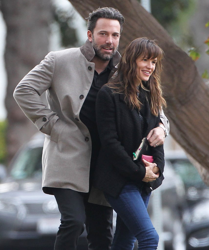 Ben cuddled up to Jen as they took a walk in LA in December 2014.