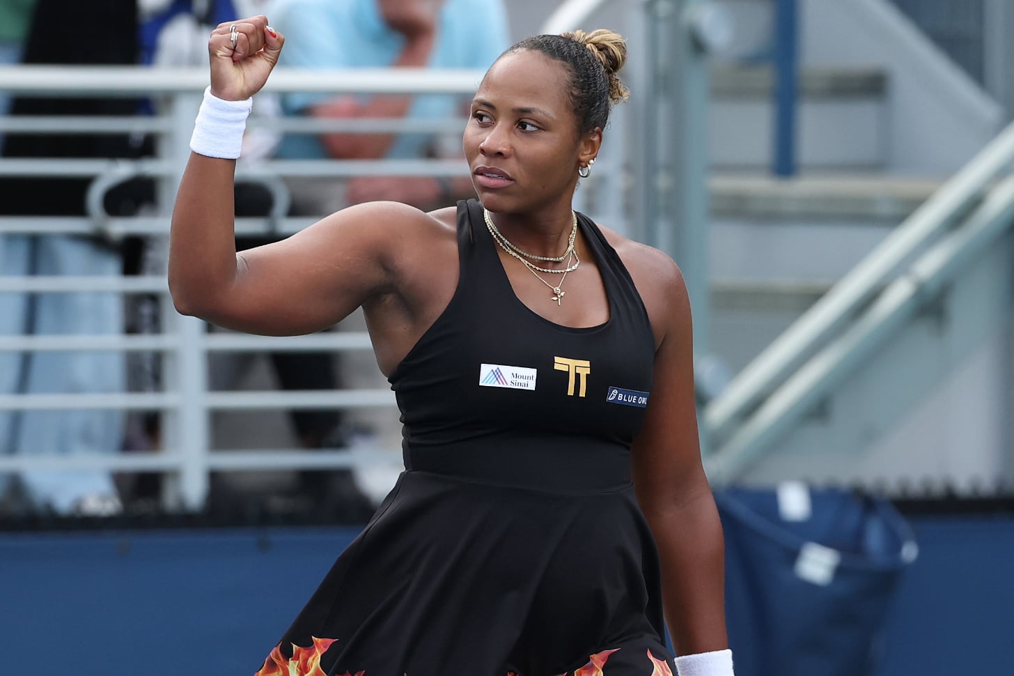Taylor Townsend of the United States celebrates winning match point against Jelena Ostapenko 