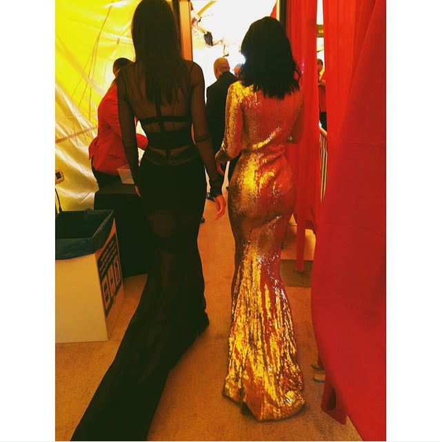 Kylie gave us a glimpse of the back of the ladies' dresses, captioning her photo with the sister emoji!