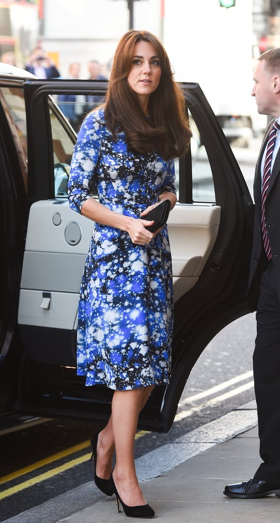 The duchess completed her graphic-print dress with a pair of tall black pumps.