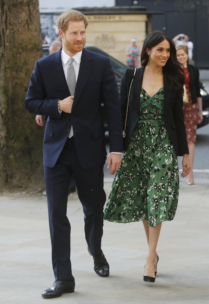 When he attended the Invictus Games Reception in April 2018, Harry wore a dark blue suit with a white shirt and grey tie, while Meghan stunned in a floral Self Portrait dress.
