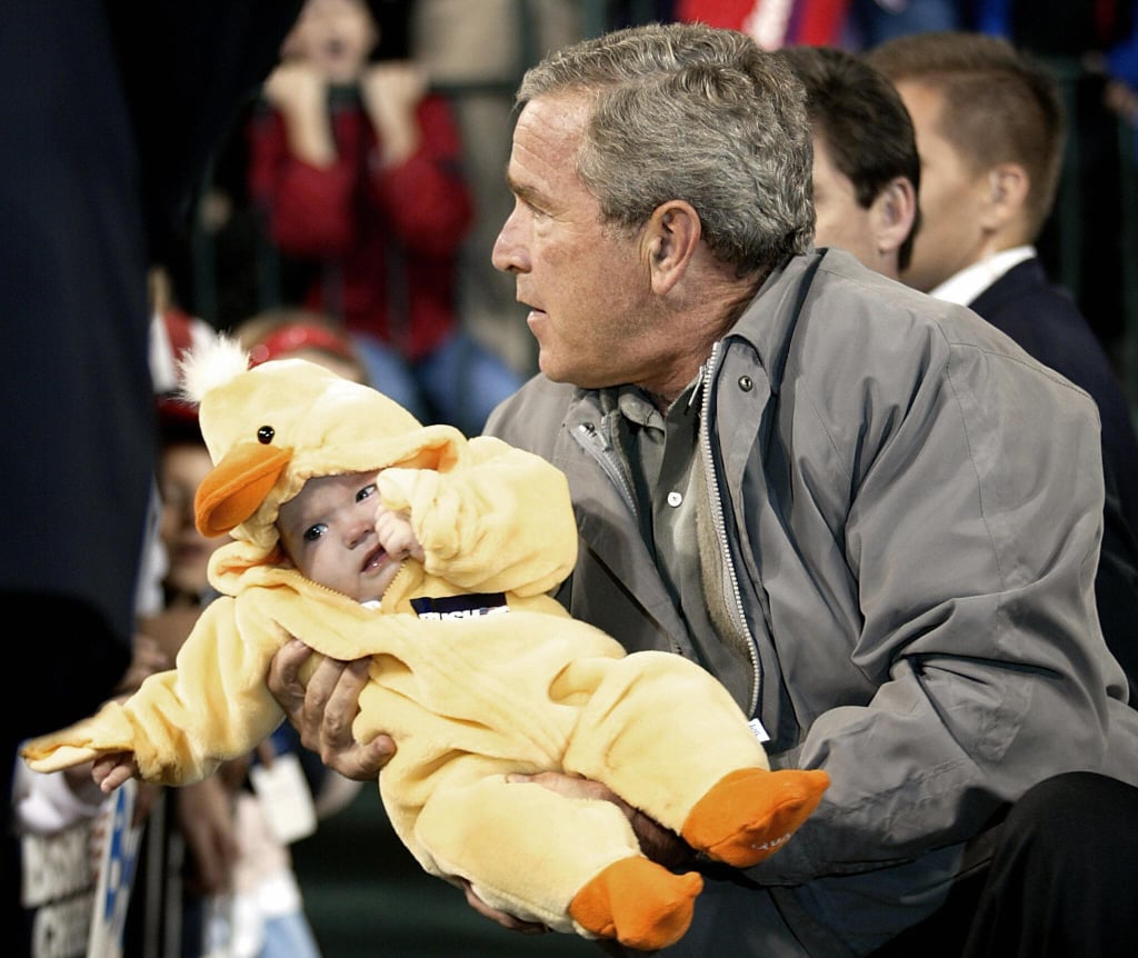 George W. Bush got in the Halloween spirit holding a duck-clad supporter in the final days of the 2004 presidential campaign.
George W. Bush got in the Halloween spirit holding a duck-clad supporter in the final days of the 2004 presidential campaign.