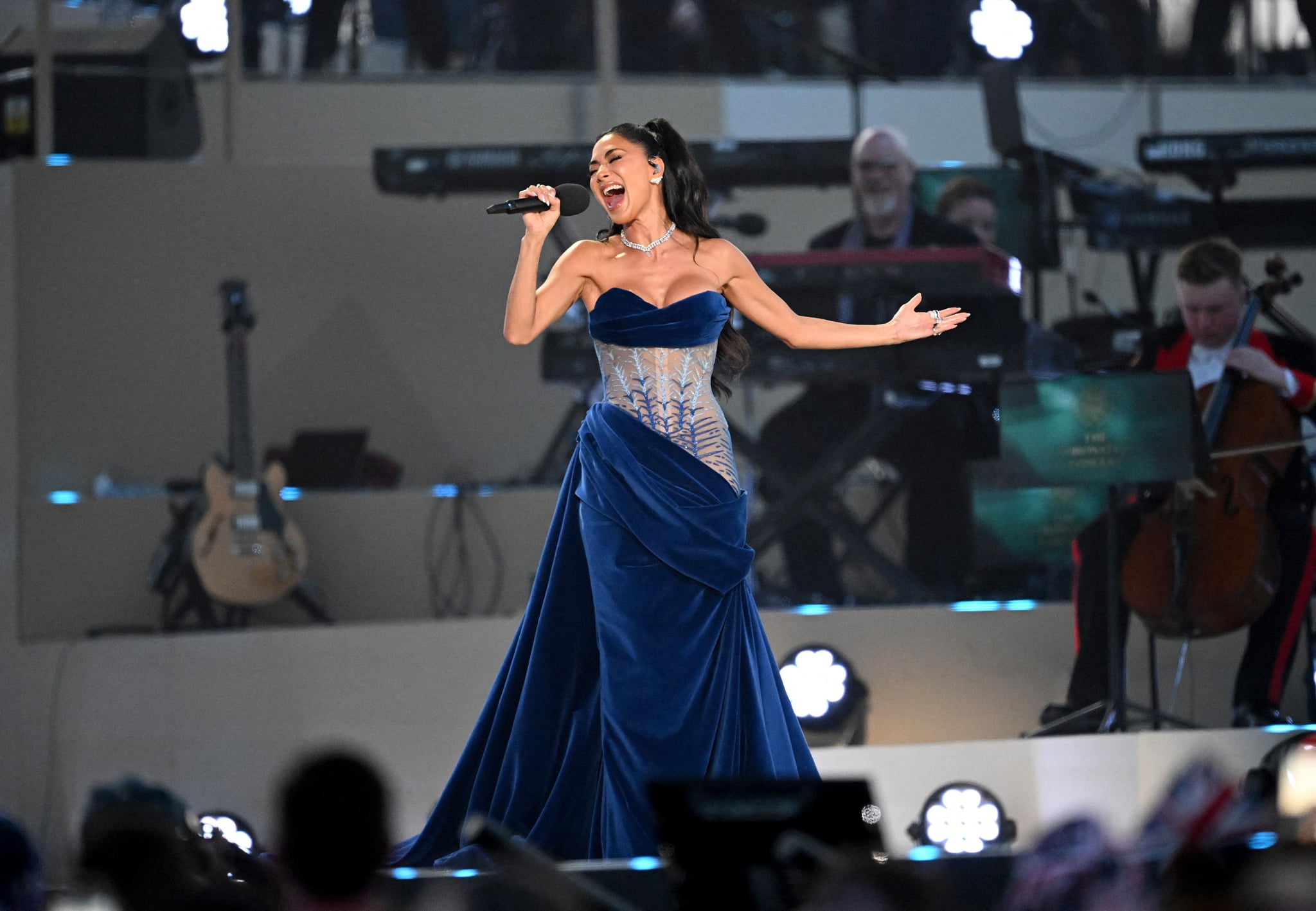 US singer-songwriter Nicole Scherzinger performs inside Windsor Castle grounds at the Coronation Concert, in Windsor, west of London on May 7, 2023. - For the first time ever, the East Terrace of Windsor Castle will host a spectacular live concert that will also be seen in over 100 countries around the world. The event will be attended by 20,000 members of the public from across the UK. (Photo by Leon Neal / POOL / AFP) (Photo by LEON NEAL/POOL/AFP via Getty Images)