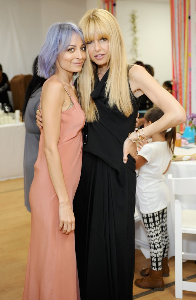 A purple-haired Nicole reunited with Rachel Zoe at the Baby2Baby Mother's Day bash in April 2014.