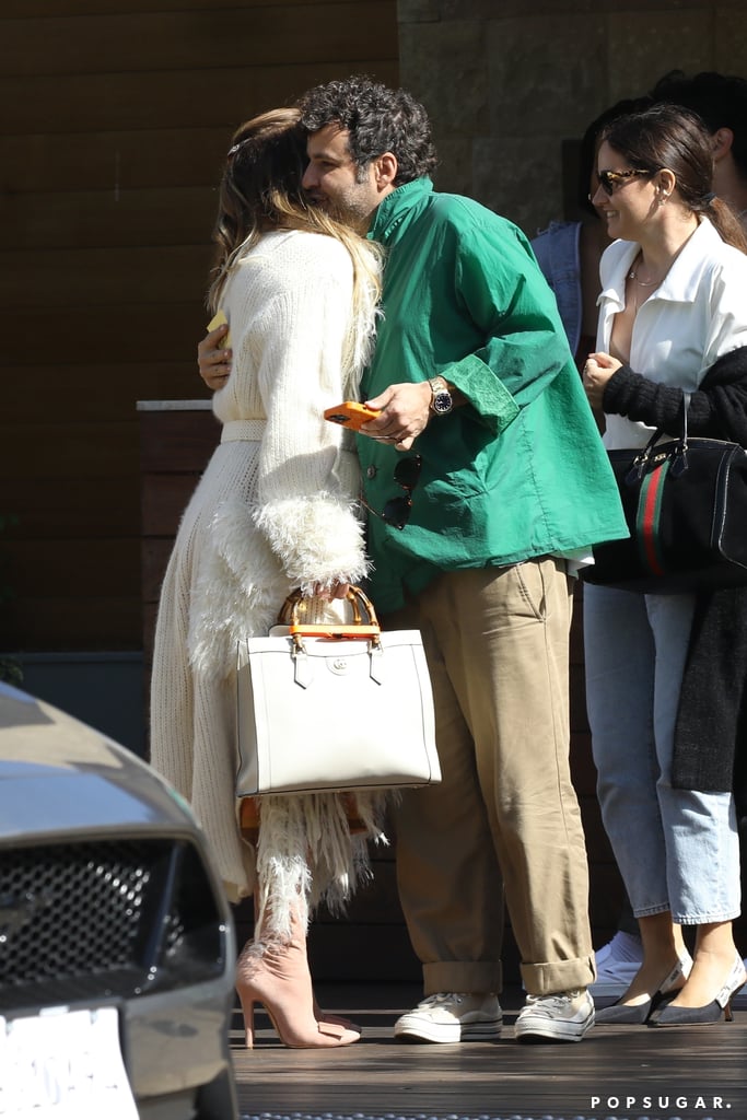 Jennifer Lopez Wears a Feather and Fringe Boho Knit Cardigan