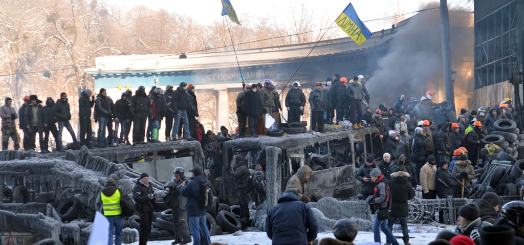 They lined up along icy trucks, waving flags as they continued to protest.