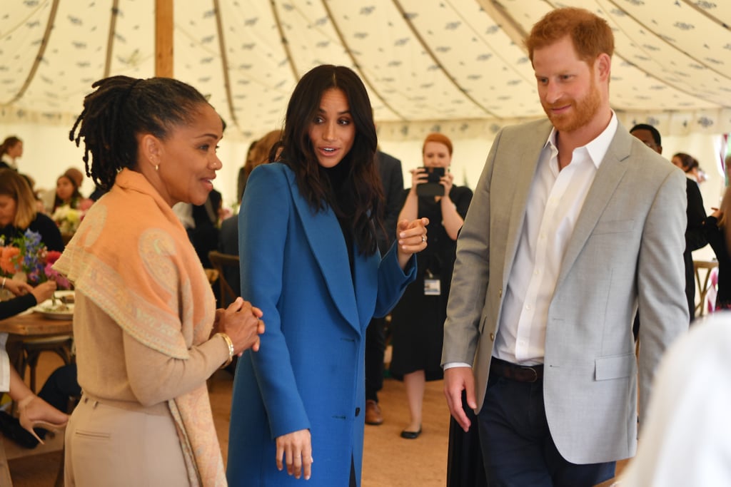 Prince Harry Fixing Meghan Markle's Hair at Cookbook Launch