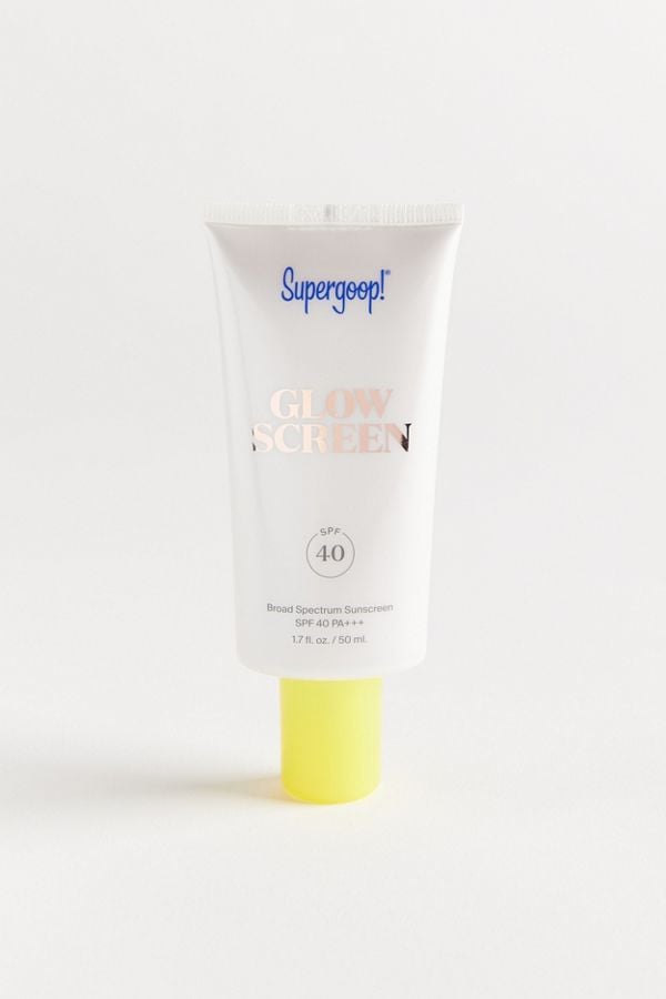 Full disclosure: I wear very — emphasis on the very — light complexion products to begin with, so I'm not claiming Supergoop! Glowscreen Sunscreen SPF 40 ($36) will make any full-coverage enthusiasts give up their ways, but it made all the difference for me. 
The formula has a light, barely-there tint and a pearlescent shine that looks like you bathed in highlighter (but like, in a really, really good way). I smeared it on with my fingertips and found it absorbed within seconds. It feels hydrating immediately upon application thanks to hyaluronic acid and vitamin B5, but not greasy or wet like the sunscreen you grew up slathering on before pool days. To add to its list of benefits, it has sea lavender which is a powerful antioxidant and cocoa peptides to protect the skin from blue-light damage — something I'm deathly afraid of, especially because I spend the day sitting in front of a computer screen. 
For the purpose of this experiment, I skipped the primer to test Supergoop!'s "makeup-gripping" claim and then proceeded with applying the rest of my face — concealer (I said no foundation but I'd be crazy not to give myself at least a little coverage), bronzer, and blush. To highlight my cheekbones I dabbed on a little extra Glowscreen with my fingertips before finishing up with my eye makeup.