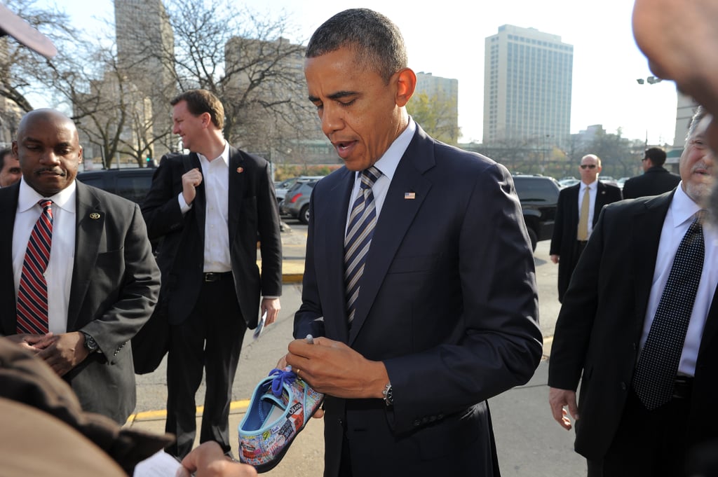 Signing a shoe while visiting Chicago in 2012.