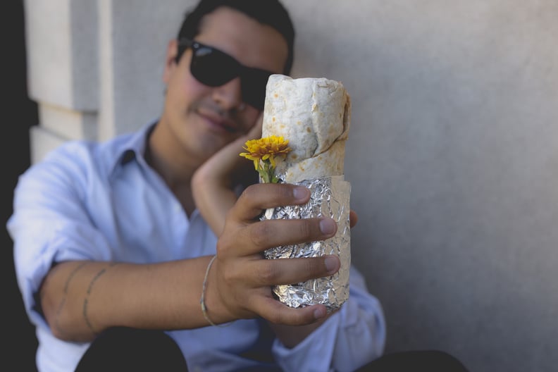 Exchanging loving glances with a flower tucked behind her ear — um, her foil.