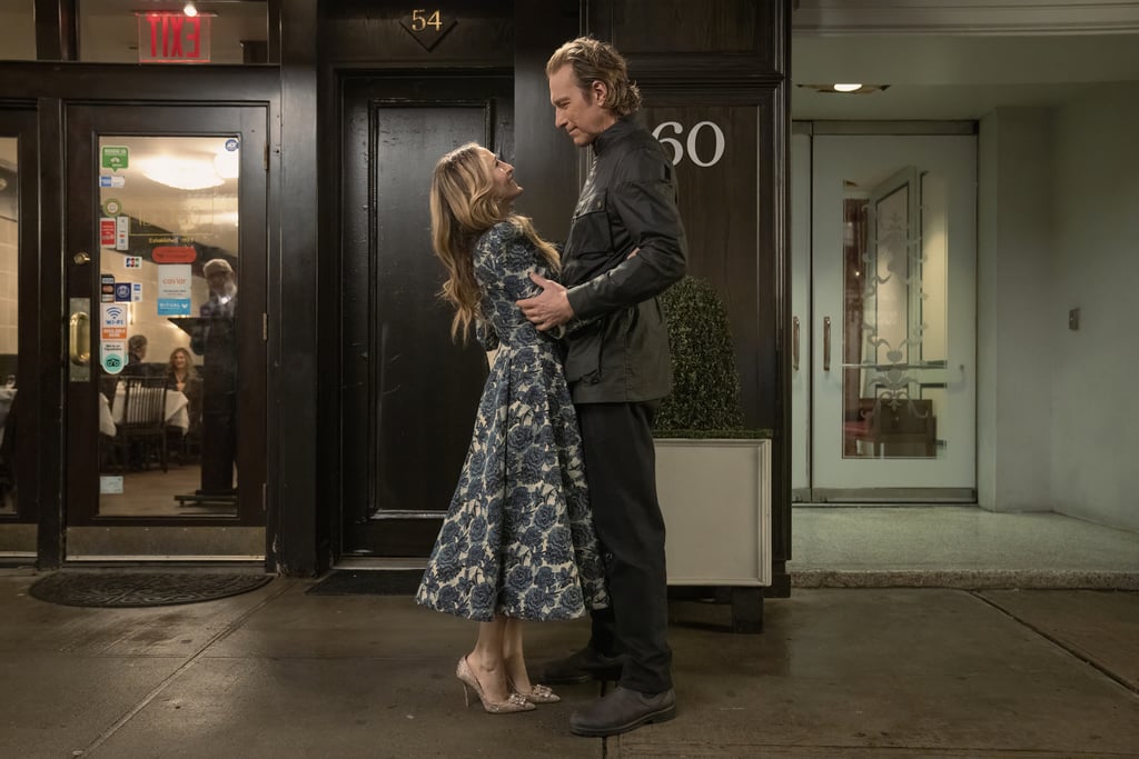 Third Time's a Charm?
"And Just Like That" social media accounts dropped a bomb on us in January when they posted a photo of Carrie holding hands with former fiancé Aidan. Since then, Parker has shared photos of Carrie and Aidan kissing, and on-set photos show them strolling along a Coney Island boardwalk. A season trailer shows that it's Carrie who reaches out first, with a "Hey stranger…" email — do those ever end well? According to Deadline, Corbett is set for a substantial multi-episode arc. Let's pray that isn't code for "situationship."
A quick refresher: The last time Carrie and Aidan saw each other was in Abu Dhabi in "Sex and the City 2," when they magically ran into each other after two failed attempts at a relationship. They spent a night catching up and shared a passionate kiss, all while they were both married to other people. Messy!
Carrie (Dressing Like She's) Getting Married
In the first "Sex and the City" movie, Carrie was all dressed up and ready to marry Big in a giant, corseted Vivienne Westwood wedding dress, topped with a bold feathered headpiece. In a gut-wrenching moment, Big gets cold feet and leaves her at the altar, resulting in Carrie beating him with flowers on a Manhattan street and giving us the iconic Charlotte line "I curse the day you were born!" 
Carrie and Big ultimately reconcile and have a more low-key wedding, with Carrie opting for a simpler dress and leaving the Westwood in storage. Until now. On-set photos show Carrie donning the dress and the bird hat again, accessorizing with turquoise shoes and gloves. What's that all about? Is it a way to remember Big? A tribute to the late English designer? A dream sequence? Wild idea: Is she marrying Aidan?