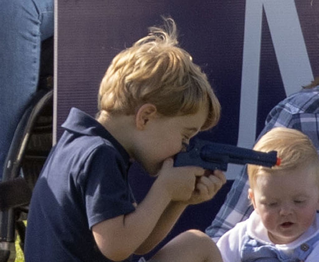 Prince George Plays With Toy Gun