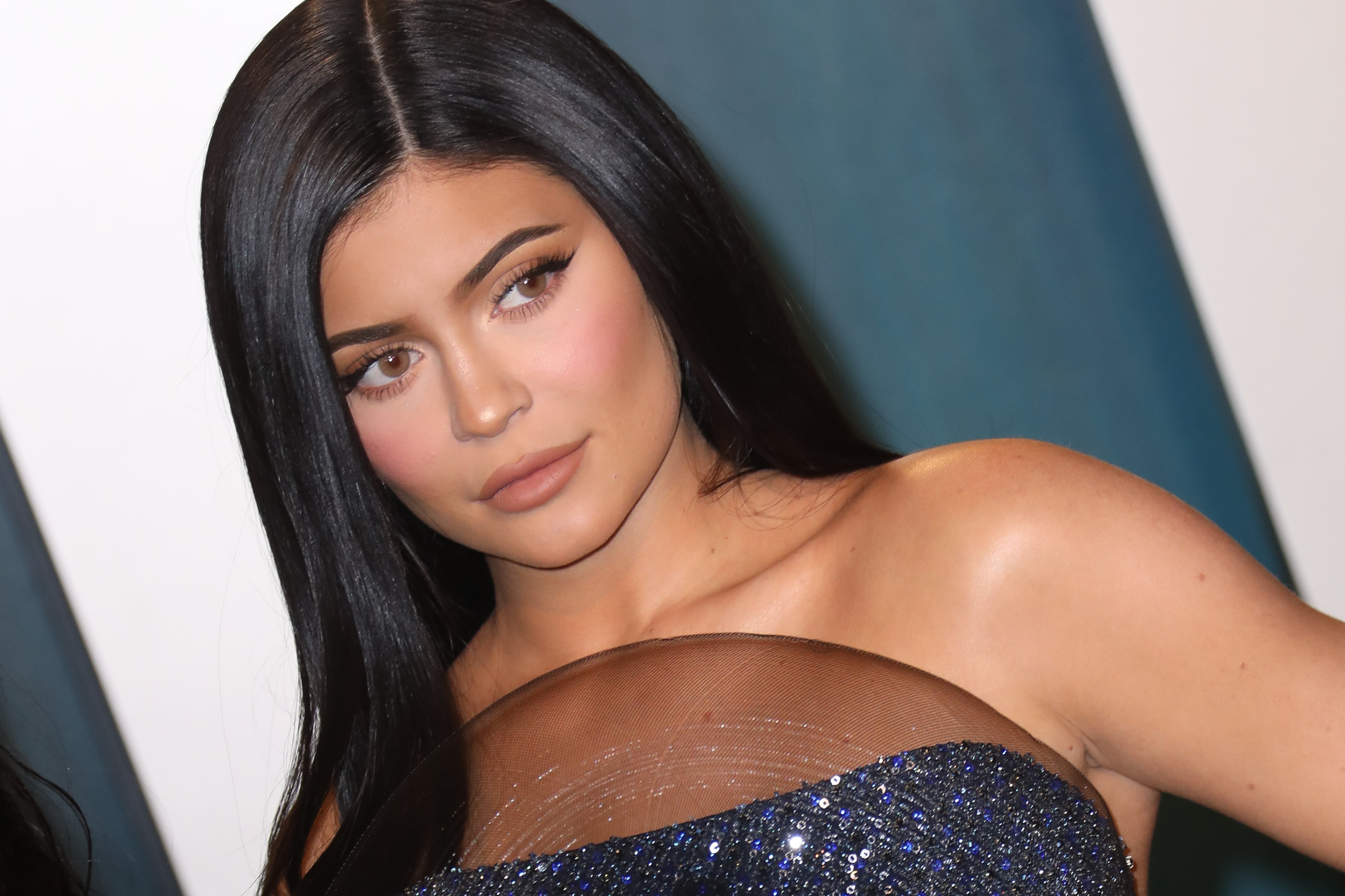 Kylie Jenner Goes '90s in Nude Bra and Baggy Jeans