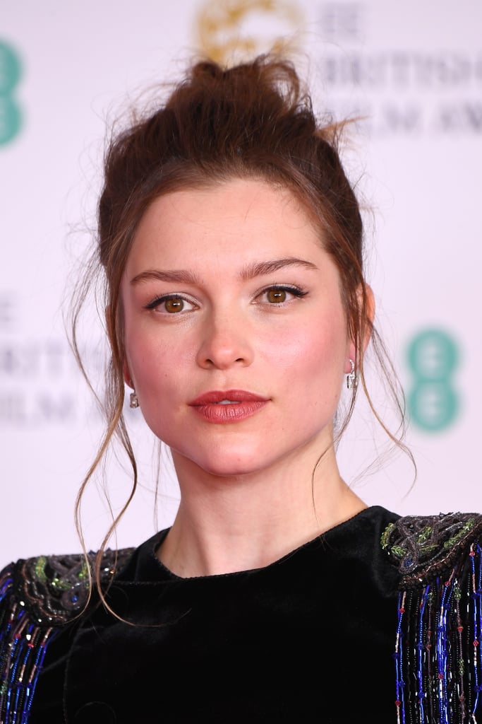 Sophie Cookson's Disheveled Topknot