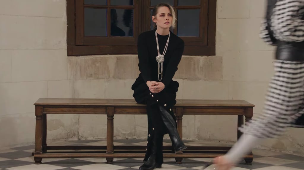 Oh, to be Kristen Stewart, swathed in Chanel and seated in the alcove as the sole guest of the storied fashion house's runway show in a 16th century French chateau in the Loire Valley. 
The actress and internet girlfriend was the only person in attendance when Chanel presented its newest Métiers d'art collection on Dec. 3, and though we certainly miss the excitement of bustling fashion presentations, we'd honestly be fine if shows were exclusively attended by Kristen going forward. Think about it: no networking or small talk, no fashionably late guests holding up the models, no squeezing into a seat next to someone you don't know. Just Kristen. How freeing! 
In a video of the complete show shared by the brand, viewers will be able to catch glimpses of Kristen watching as models walk by, peeking out her head to get a better look, and, at the end, standing up to applaud Creative Director Virginie Viard. The internet understandably erupted upon seeing screenshots, describing it as a "flex" and "some legend sh*t." Making her even more legendary, Kristen, who's been a brand ambassador since 2013, will also model pieces from the new collection in an upcoming campaign. 
See photos of the collection, and Kristen marveling at said collection with no one around to bother her, ahead. 

    Related:

            
            
                                    
                            

            Will Virtual Runway Shows Alter Fashion&apos;s Age-Old Hierarchy? Here&apos;s Hoping!