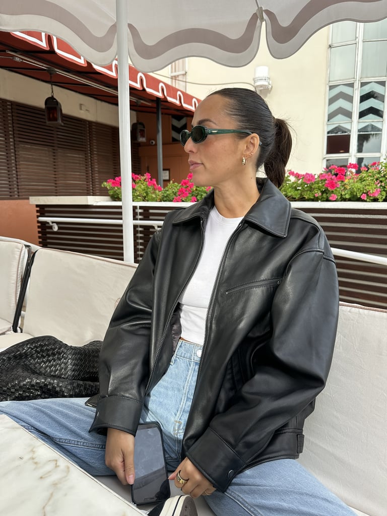 Quince 100% Leather Oversized Bomber Jacket ($250)
Height: 5'6.5"
Size: Small (sized up)
"Ever since seeing Hailey Bieber rock an oversize leather jacket, I've been obsessed with finding the perfect one. The problem? Most of the products I loved were gorgeous — but way out of my price range. I had heard about Quince from friends, and when I saw they had what looked like the perfect oversize leather jacket at one of the best prices I had seen, I jumped on it immediately. Because it was so well-priced, I was a little nervous about the quality, but as soon as I got it in the mail, I knew my concerns were nothing to be worried about. The silhouette is timeless and goes with everything in my closet, the quality of the leather is amazing, and I honestly can't leave the house in this jacket without at least one person asking me where I bought it. I'm typically an extra small but I sized up to a small, and I think it gives me the perfect oversize look." — Renee Rodriguez, beauty senior staff writer and social producer 
Rating: