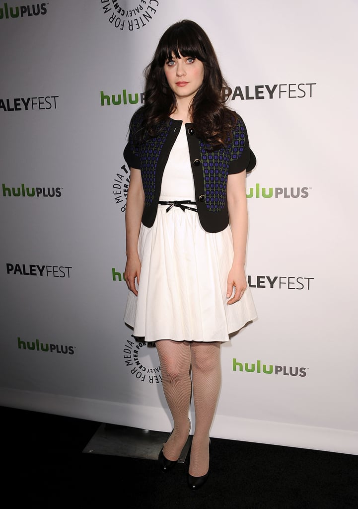 She added a cropped jacket and skinny belt to her crisp white dress for a quick jolt of color contrast at the 2012 PaleyFest New Girl panel.