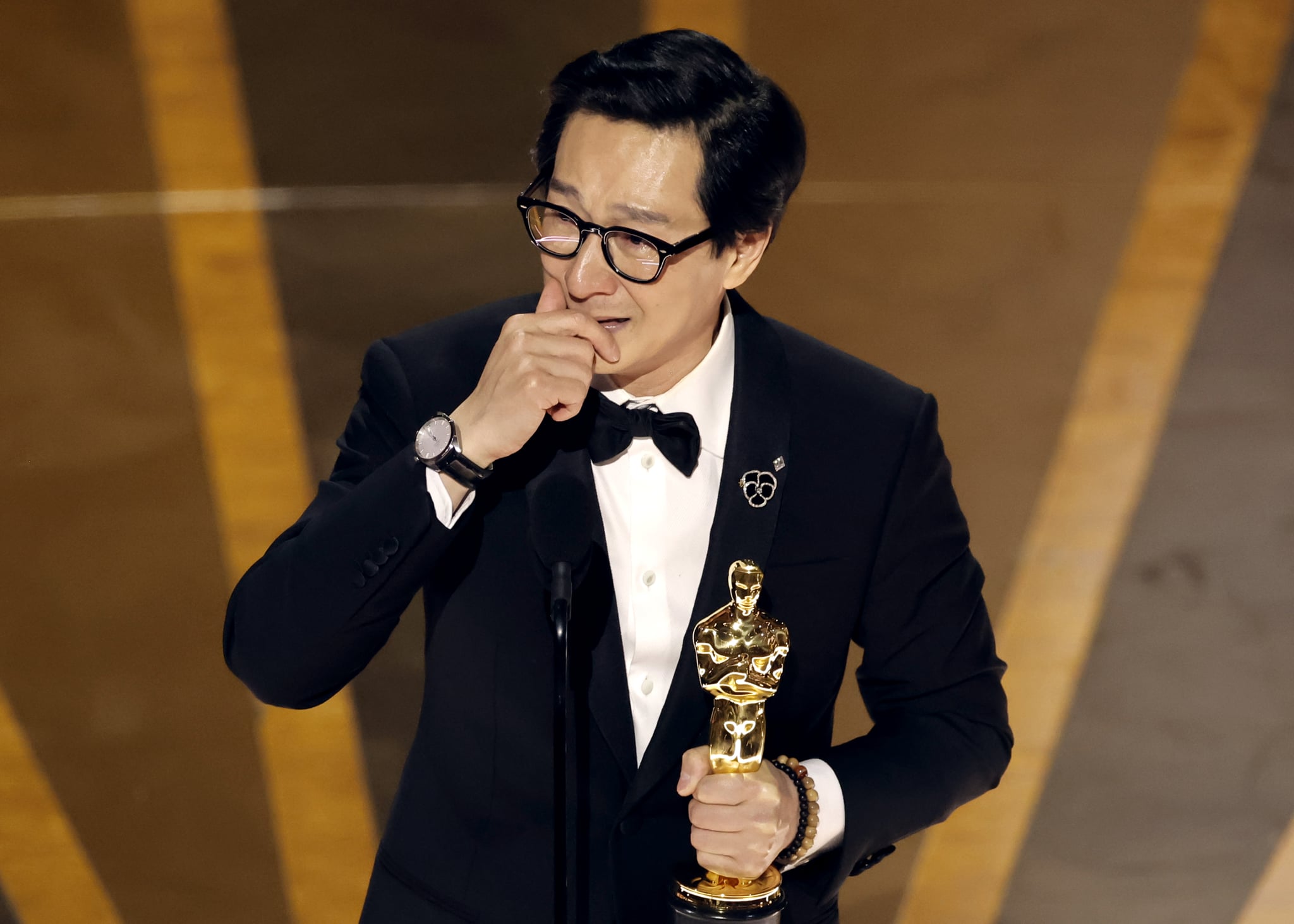 HOLLYWOOD, CALIFORNIA - MARCH 12: Ke Huy Quan accepts the Best Supporting Actor award
