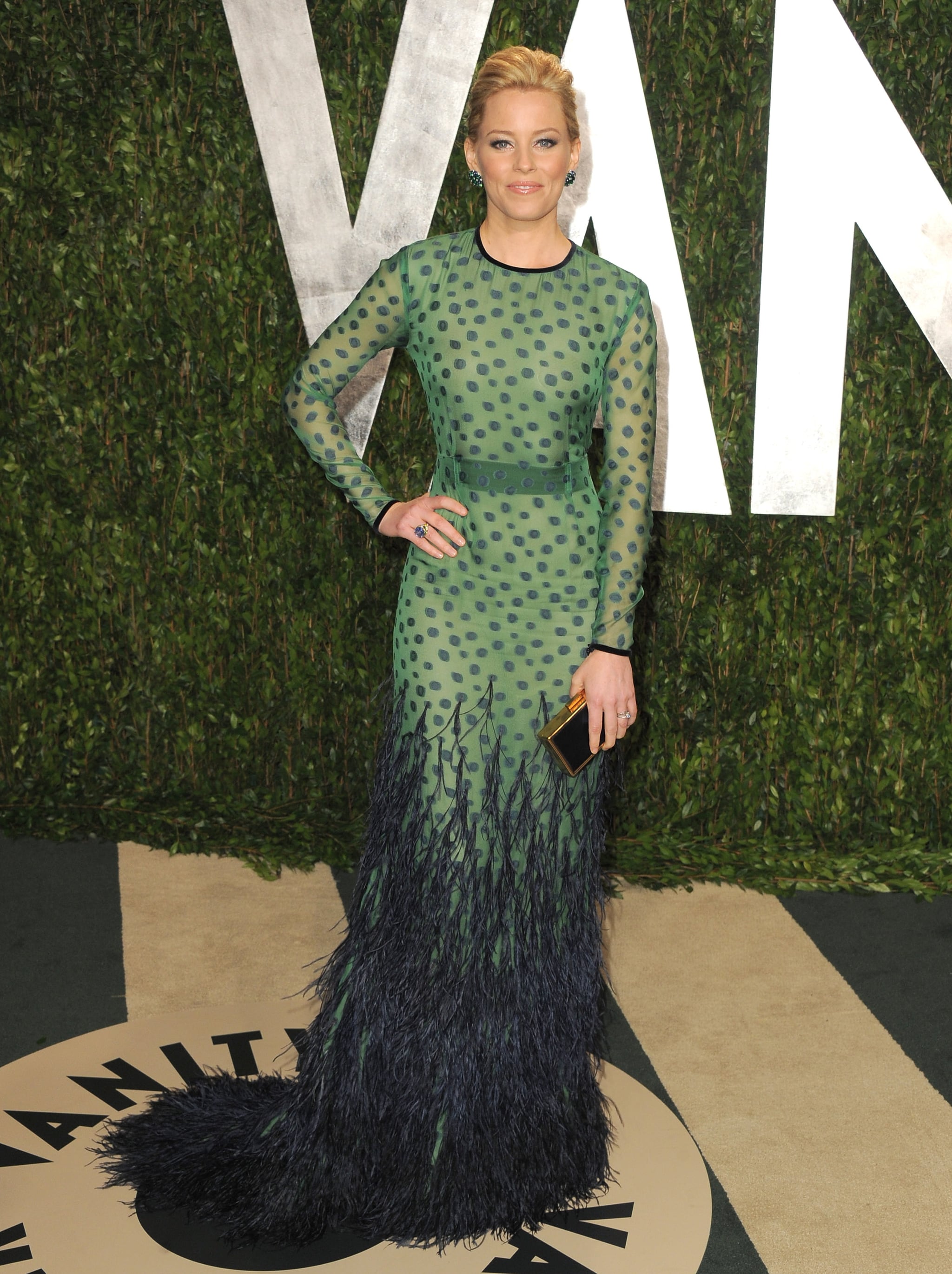 Banks in an elegant peacock-inspired Chadwick Bell frock. Banks in an elegant peacock-inspired Chadwick Bell frock.