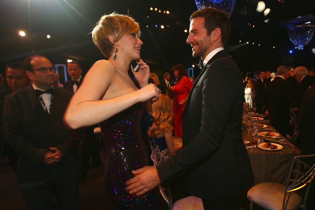 Bradley Cooper reached out for Jennifer in the audience.