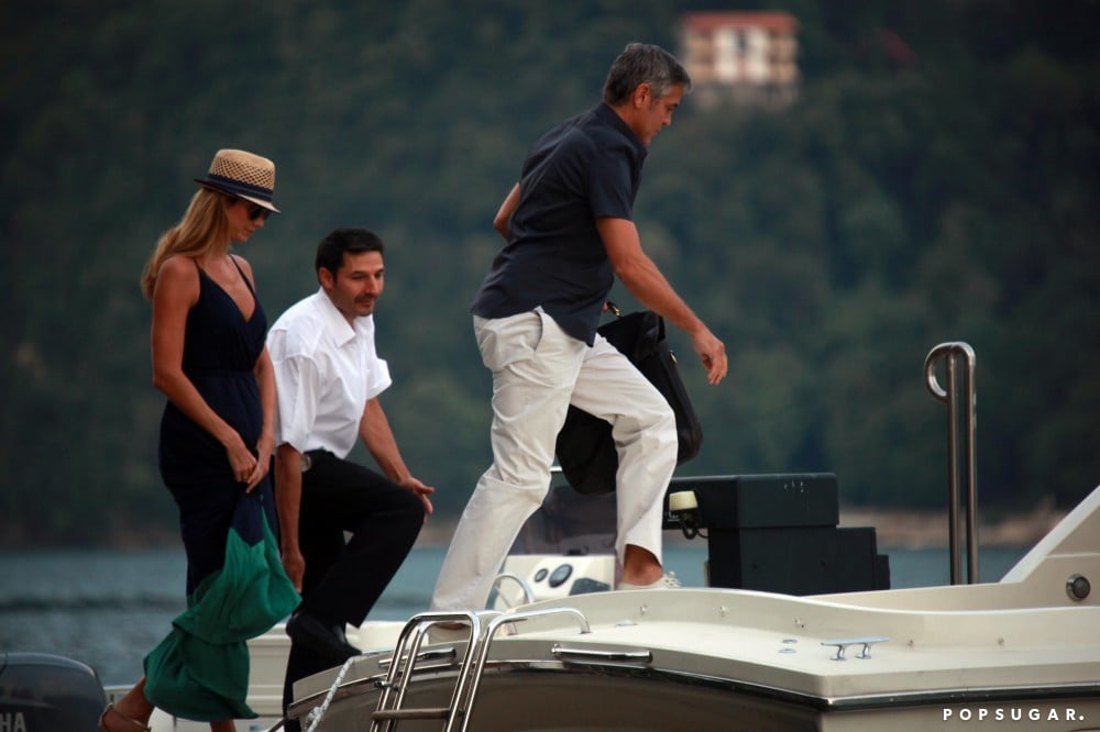 George Clooney and Stacy Keibler went for a sunset boat ride during a vacation in Lake Como, Italy in August 2012.