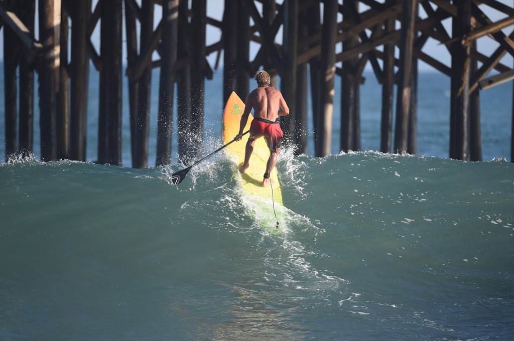 Legendary surfer Laird Hamilton took advantage of the big waves in Malibu, CA.