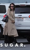 Angelina Jolie Pulled Pajamas-Under-Your-Coat Look