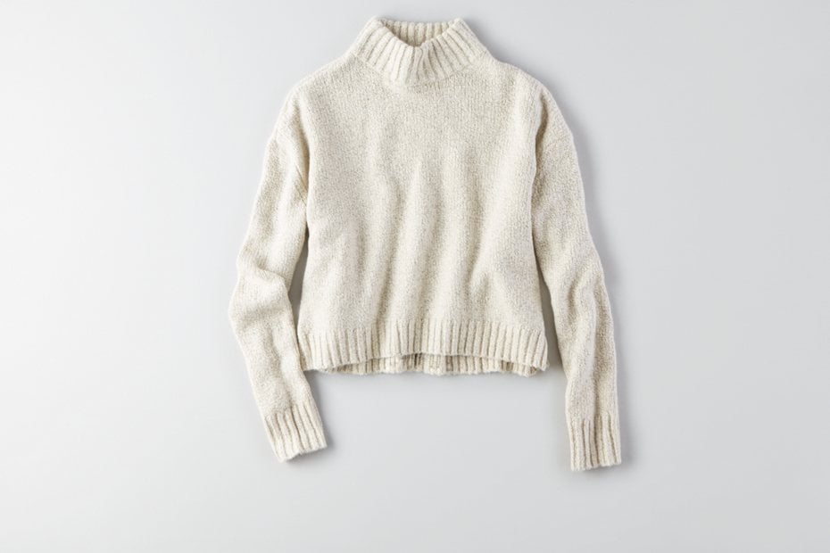 While Taylor's Design History sweater isn't available, you can get a similar version from American Eagle ($40).