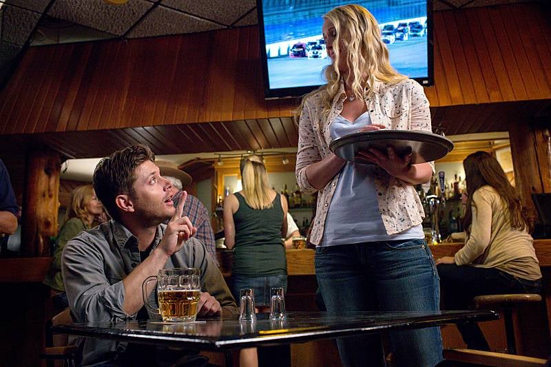 Oh, cool. He's at a bar. Jensen Ackles as Dean and Emily Fonda as Ann Marie.