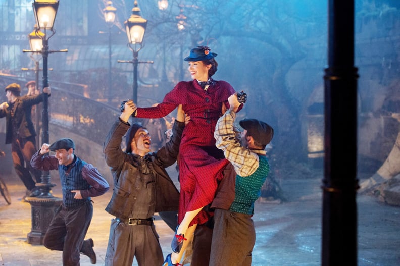 MARY POPPINS RETURNS, top: Emily Blunt as Mary Poppins, 2018. ph: Jay Maidment /  Walt Disney Studios Motion Pictures / courtesy Everett Collection