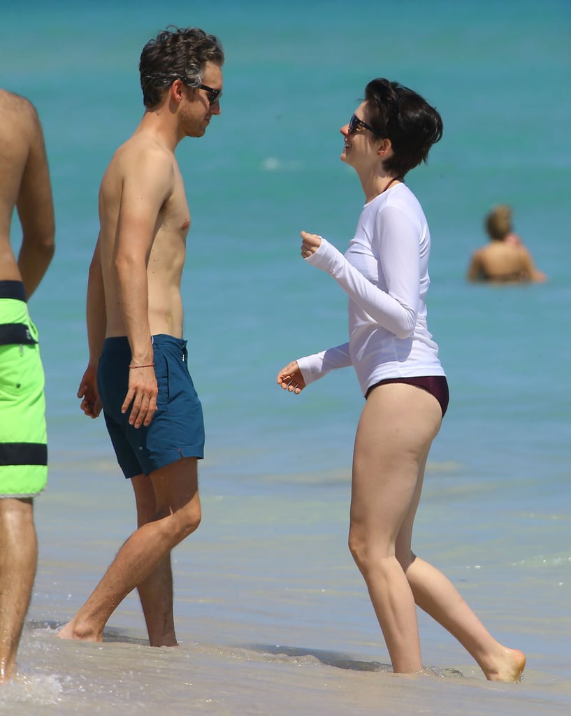 Anne Hathaway Kisses Husband in Miami Beach | Photos