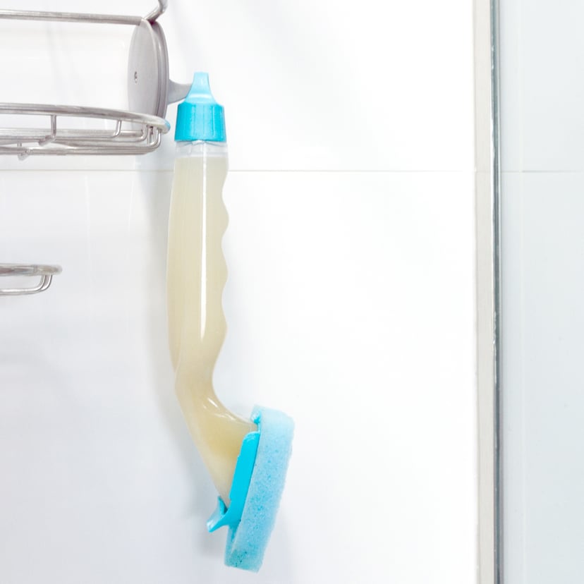 A Genius Shower Cleaning Hack: A Dish Brush
