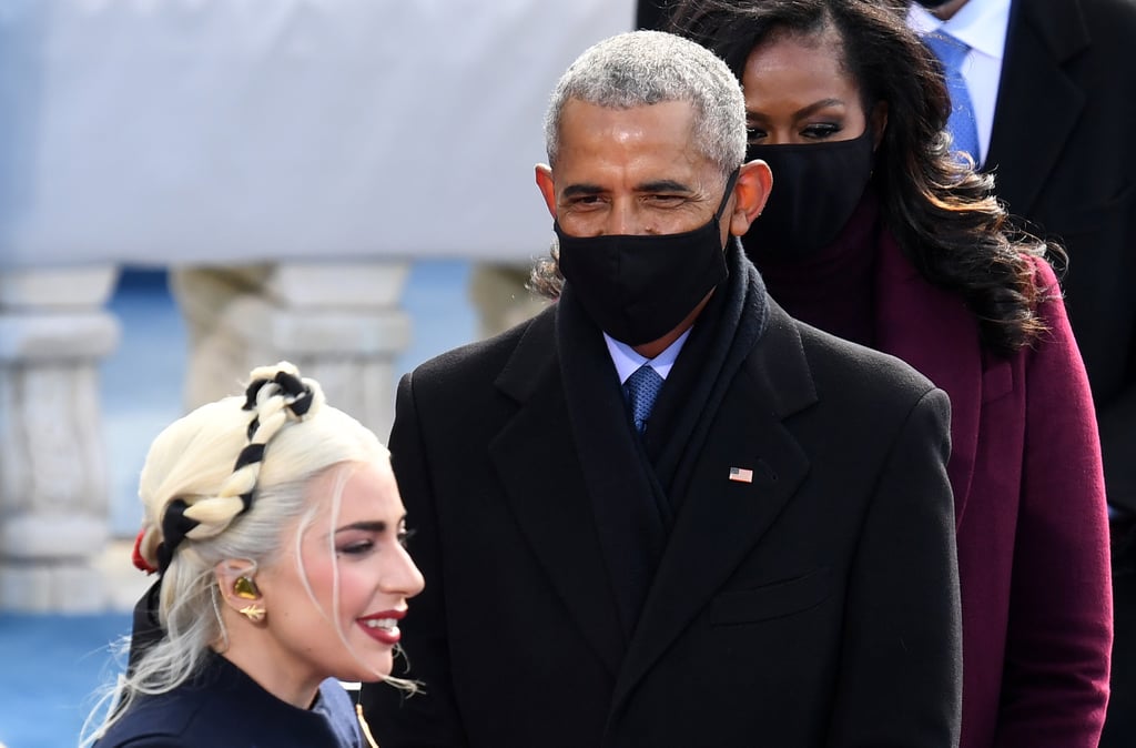 Barack Obama: "There she is! The woman of the hour. Lemme play it cool while she gets her picture taken real quick. I'll just chill here and smile from behind my face mask."
Lady Gaga: "Oh man, here comes 44. I can sense his powerful presence without even seeing him. Cue the internal fan-girling."