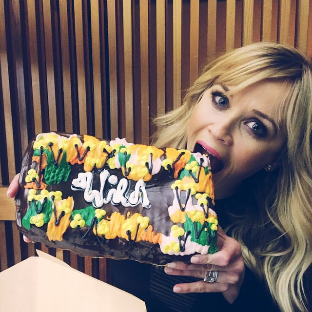 She bit into a gigantic Wild-themed doughnut.