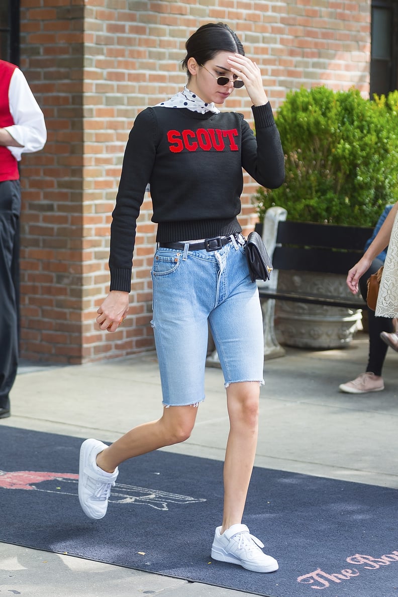 Kendall Jenner Was Spotted Leaving Her Hotel Wearing a "Scout" Sweater and Bermuda Jean Shorts