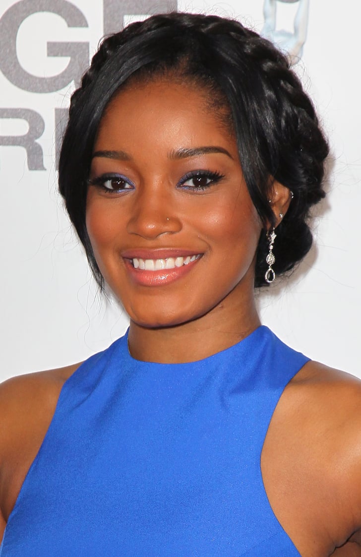 A more polished styling of milkmaid braids, like Keke ...
