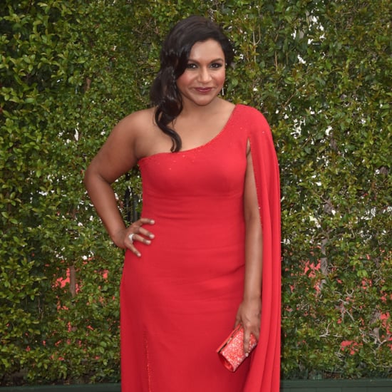 Mindy Kaling Wearing a Red Cape Dress
