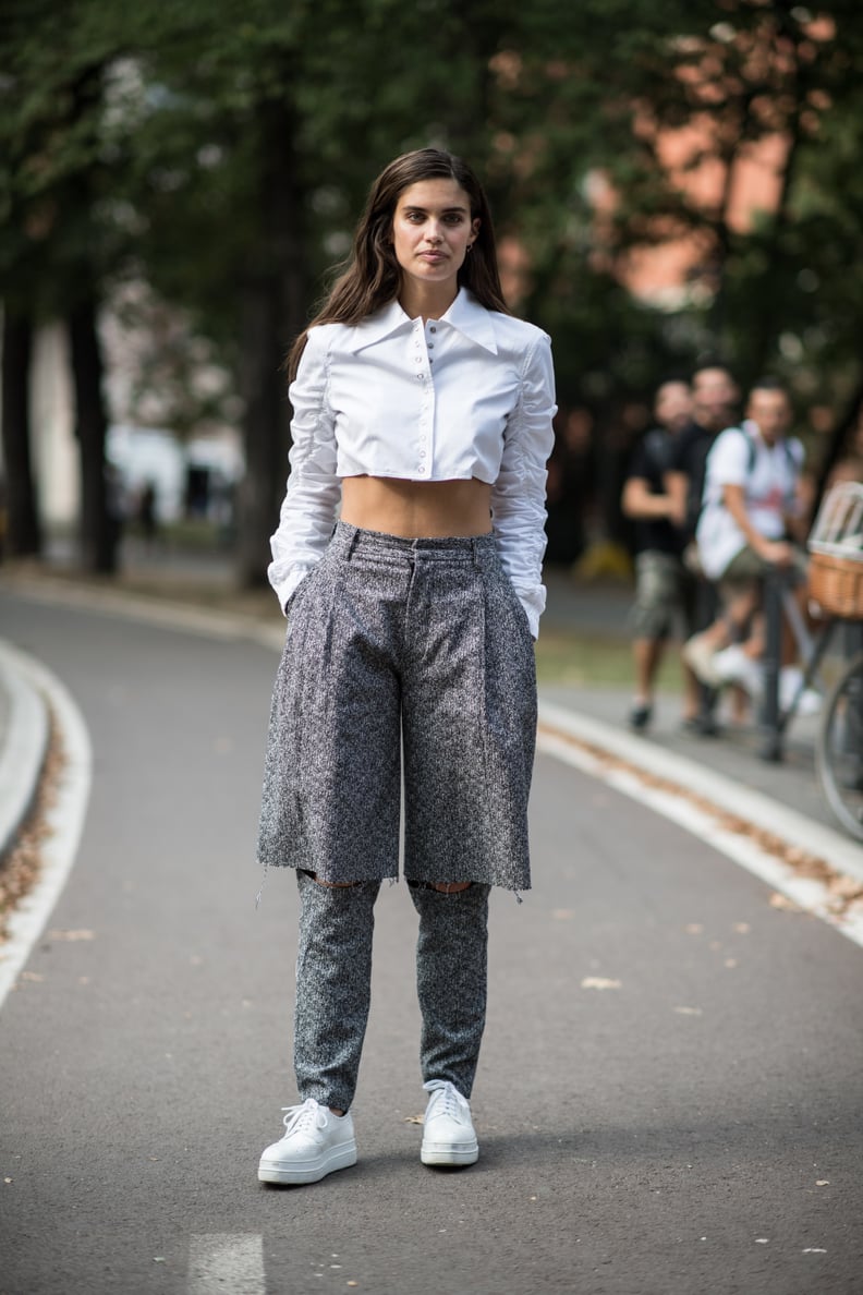 Sara Sampaio Rocked a Cropped Button Up and Tweed Trousers During MFW