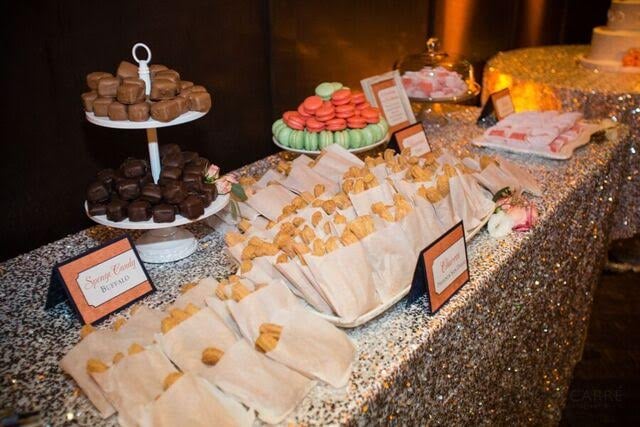 Serve a dessert buffet on glittery tablecloths.