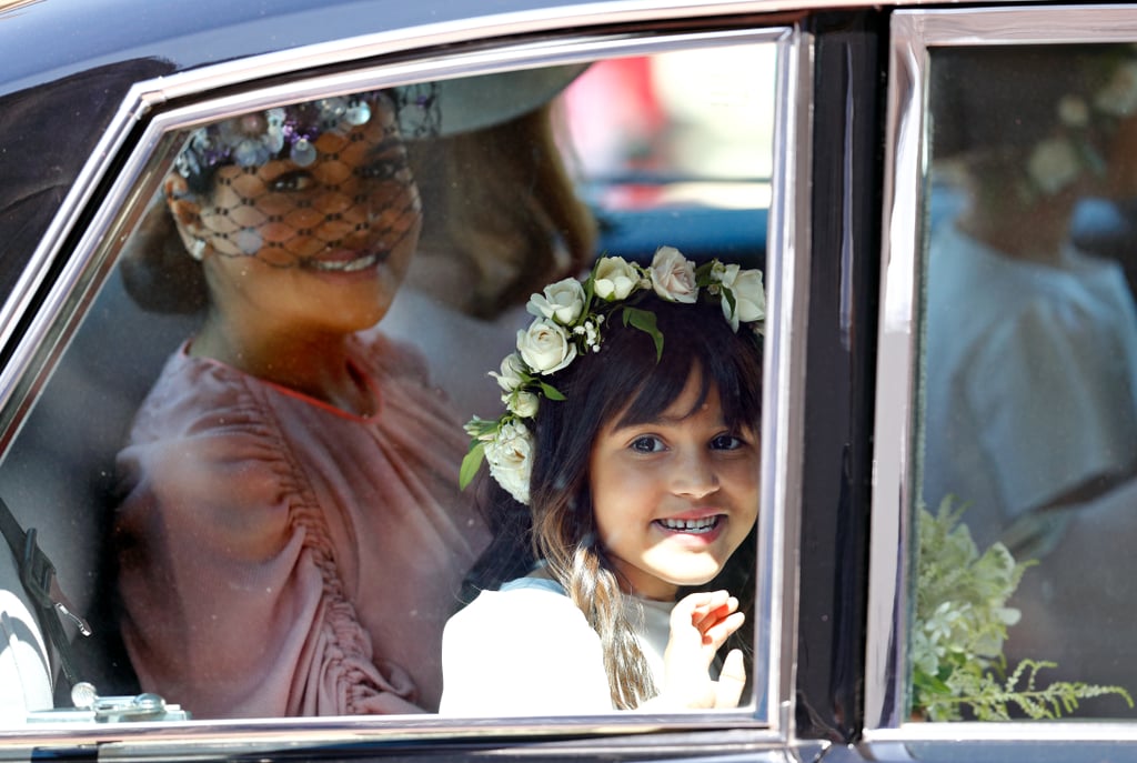 Meghan's goddaughter Remi Litt smiled for the waiting cameras.