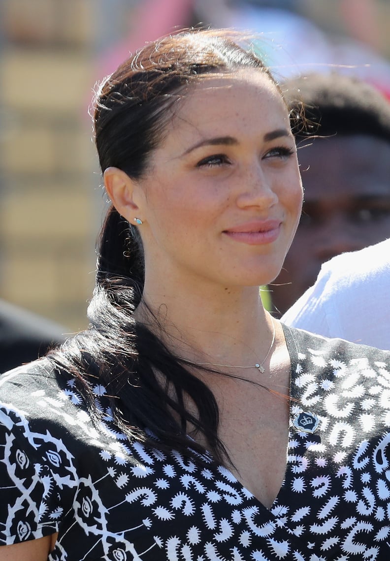 Meghan Markle Wearing an Evil Eye Necklace and Patterned Dress