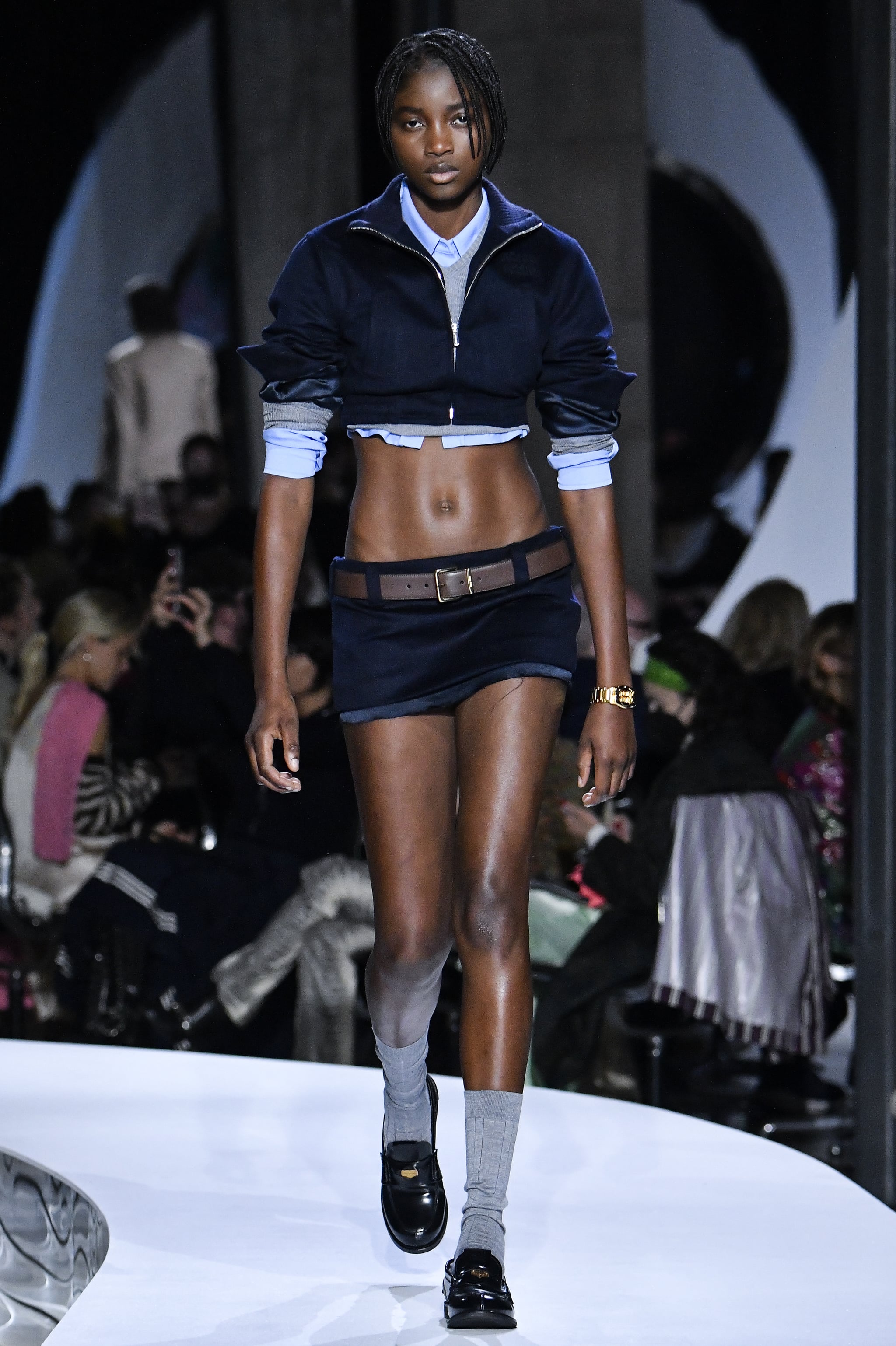 PARIS, FRANCE - OCTOBER 05: A model walks the runway during the Miu Miu Ready to Wear Spring/Summer 2022 fashion show as part of the Paris Fashion Week on October 5, 2021 in Paris, France. (Photo by Victor VIRGILE/Gamma-Rapho via Getty Images)