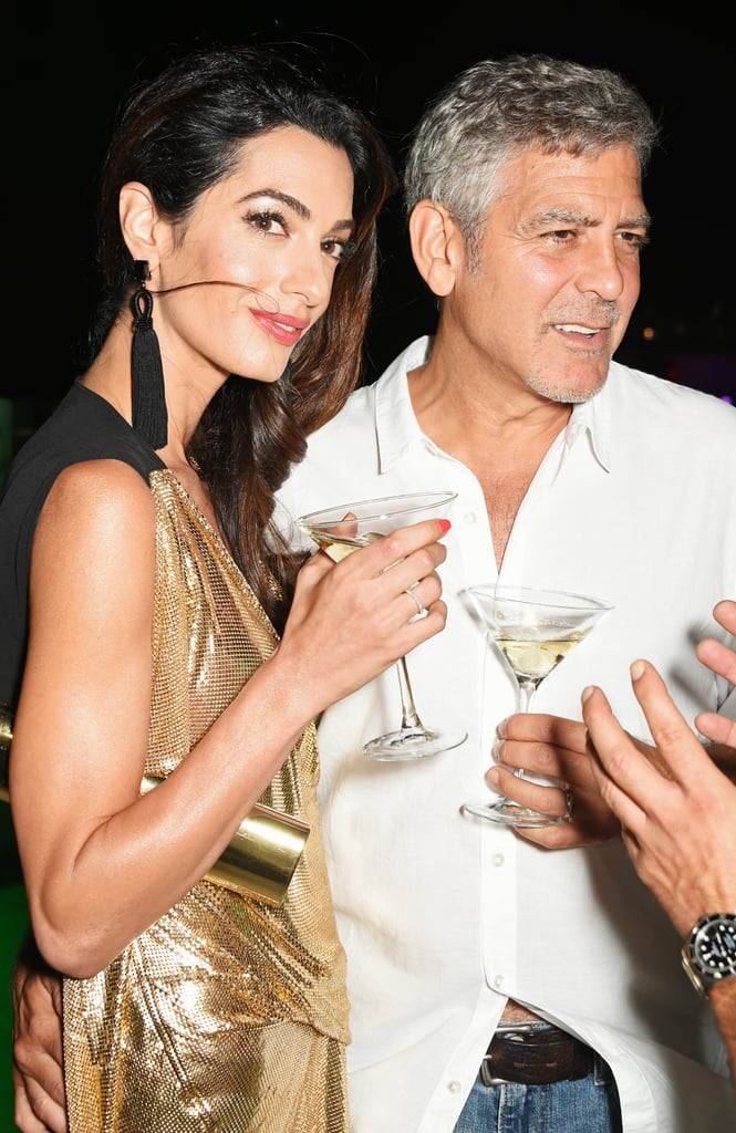 She accessorized with just the right pieces — black tassel earrings and a simple matching clutch.