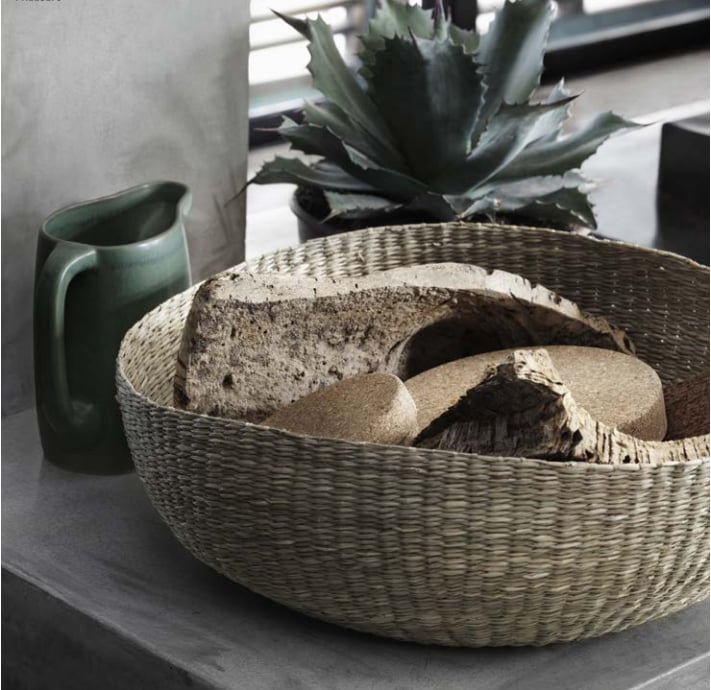 Baskets ($13) woven from dried seagrass are designed to stack for easy shipping.
