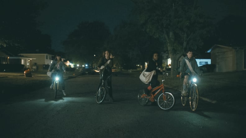The cast of Paper Girls on their bikes