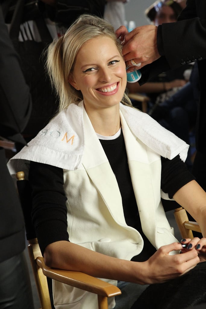 Karolina Kurkova beamed while a stylist put finishing touches on her hair at the Cushnie et Ochs event on Friday.