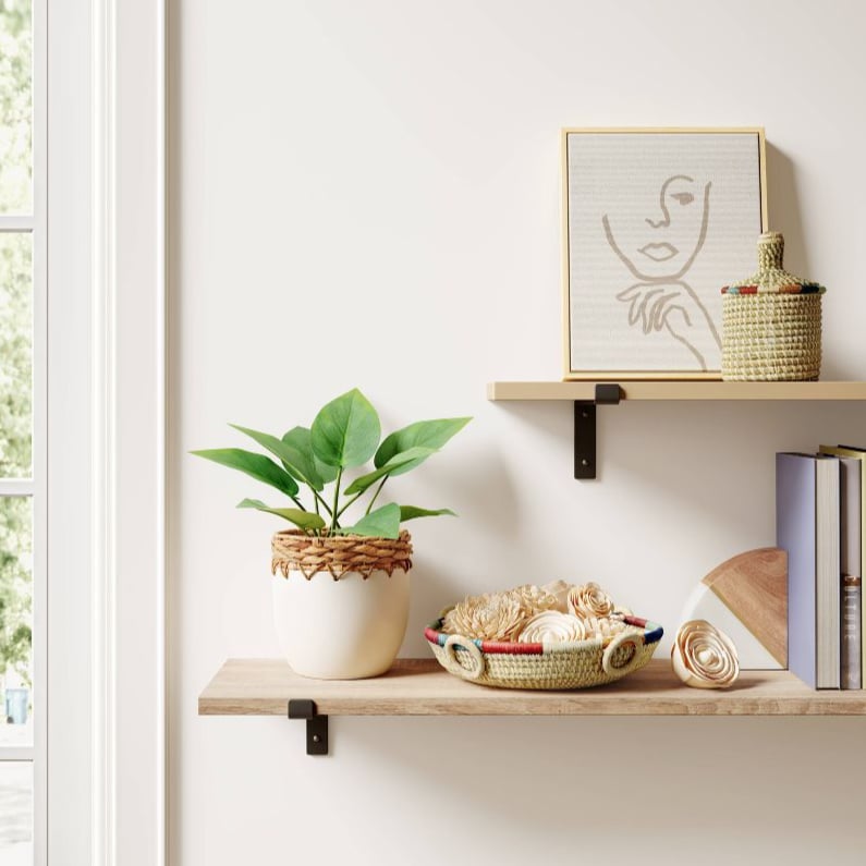 Tip 3: Place a Decorative Container on Your Bathroom Counter to Disguise Common Household Items