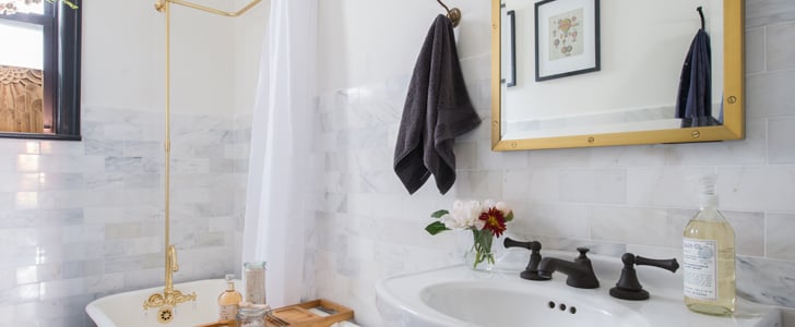 Black-and-White Bathroom With Brass Shower