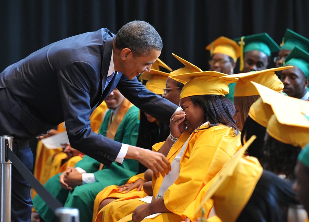 Consoling an overwhelmed student at a Memphis high school graduation